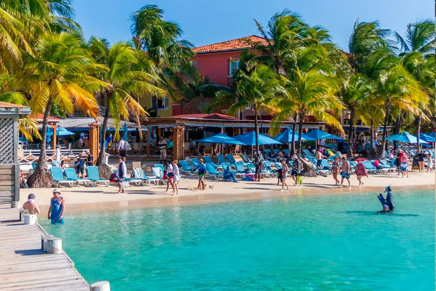 Beach and palm trees at Infinity Bay Resort, West Bay, Roatan